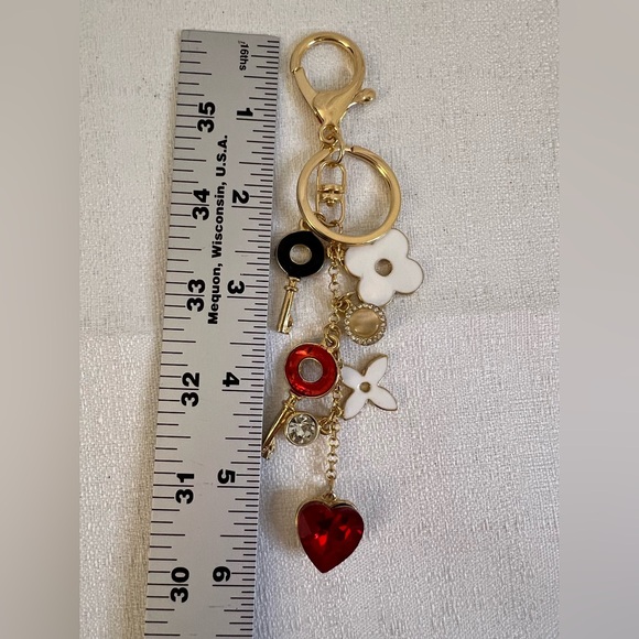 Gold-tone keychain bag charm floral design and key accents - Picture 5 of 9